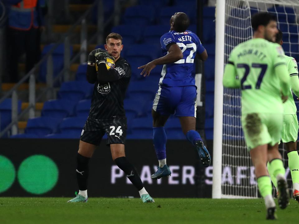 Alex Palmer grasps the ball against Cardiff