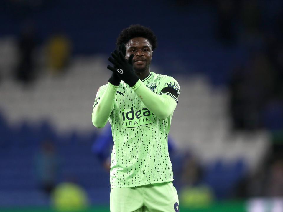 Josh Maja applauds the travelling fans at full-time