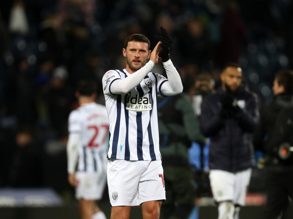 John Swift applauds supporters at full-time against Ipswich 