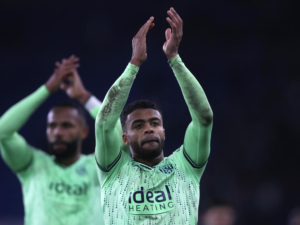 Darnell Furlong applauds the travelling fans at full-time