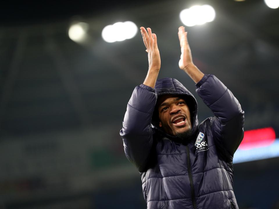 Grady Diangana applauds the travelling fans at full-time