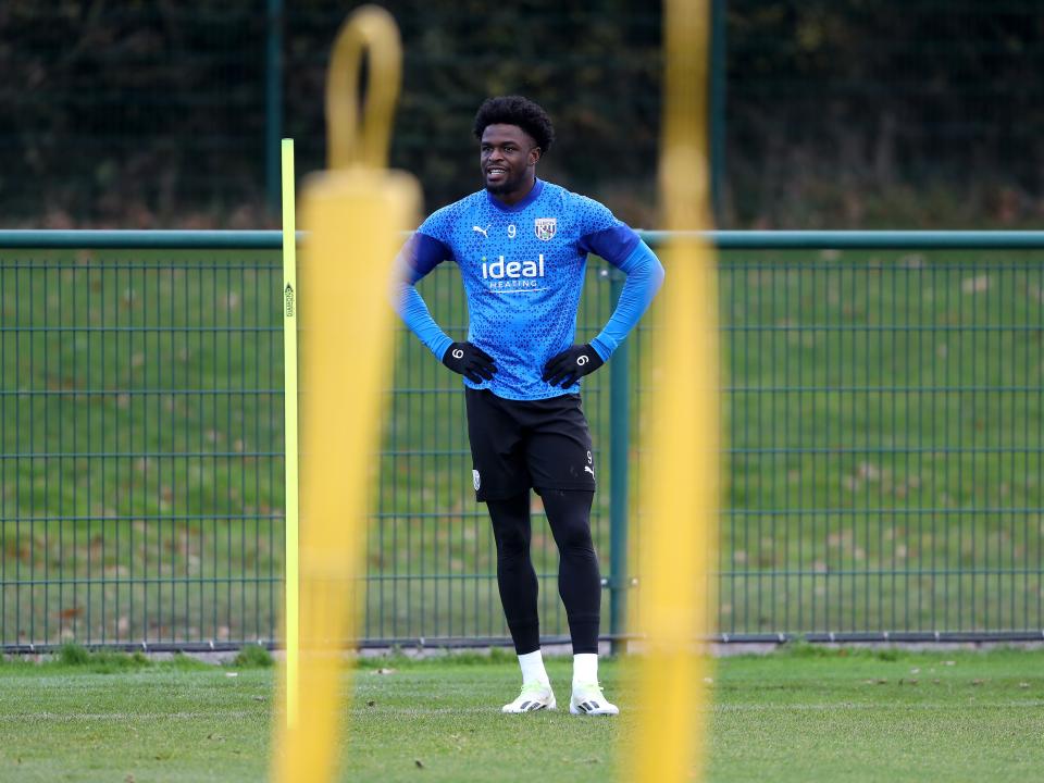 Josh Maja with his hands on his hips in training 