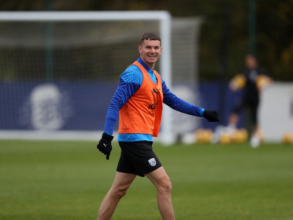 Conor Townsend smiling at the camera during training 