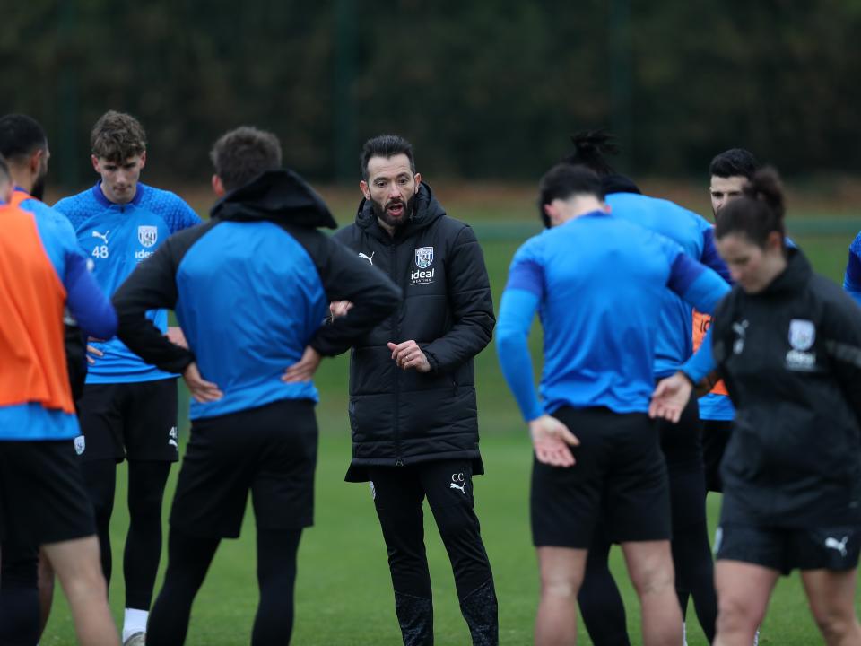 Carlos Corberán coaching during a training session