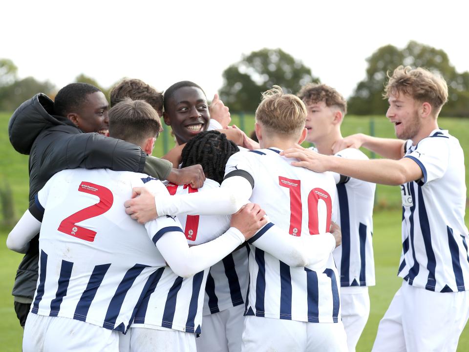 Albion U18 players celebrate after scoring a goal