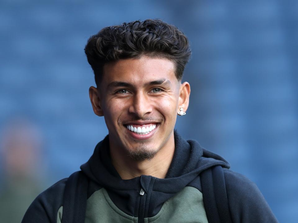 Jeremy Sarmiento looking at the camera with a big smile