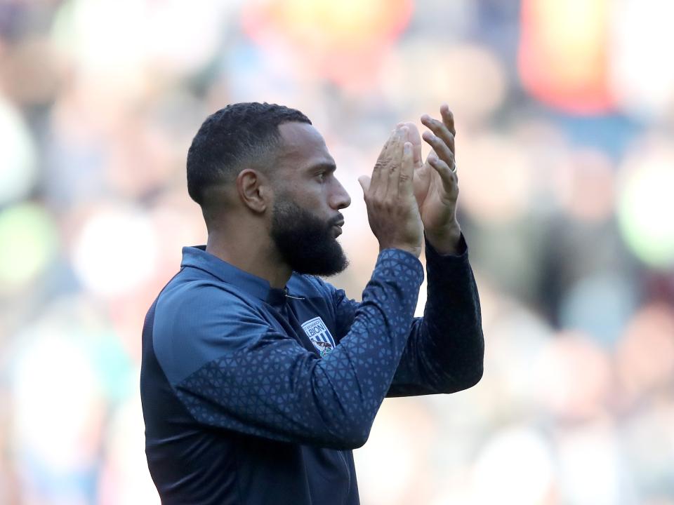 Matty Phillips applauds the supporters at The Hawthorns