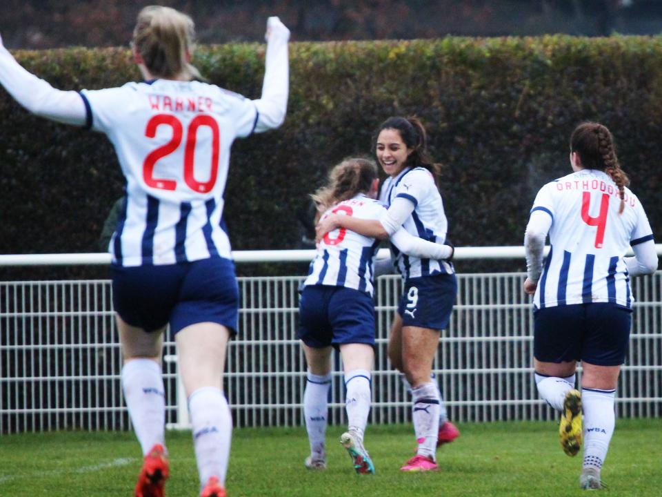 Albion Women celebrate, in home colours.