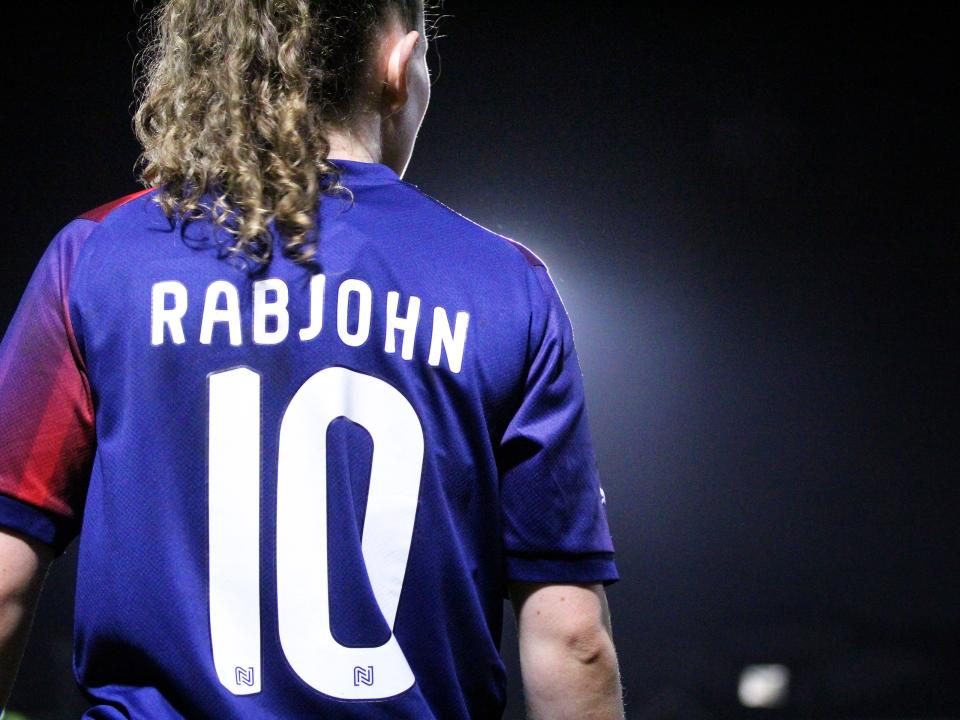 Liv Rabjohn, in red and blue away colours.