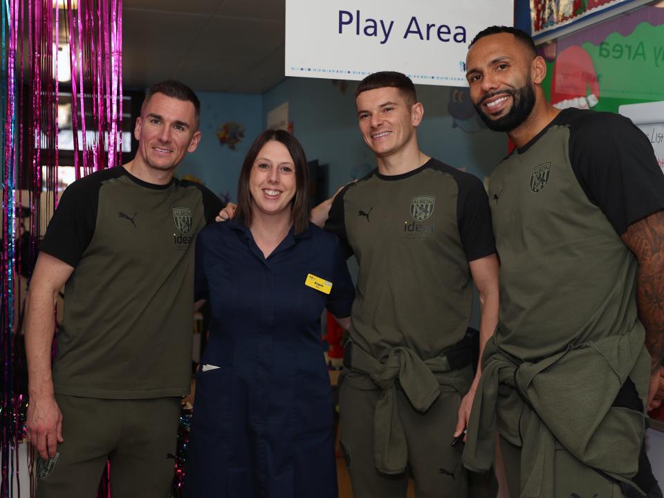 Kyle Bartley, Conor Townsend and Jed Wallace pose for a photo with NHS workers at Sandwell General Hospital