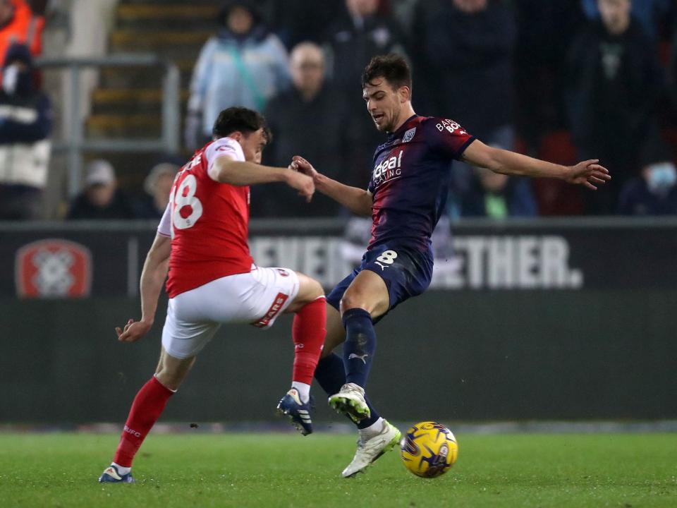 Jayson Molumby goes into a tackle against Rotherham