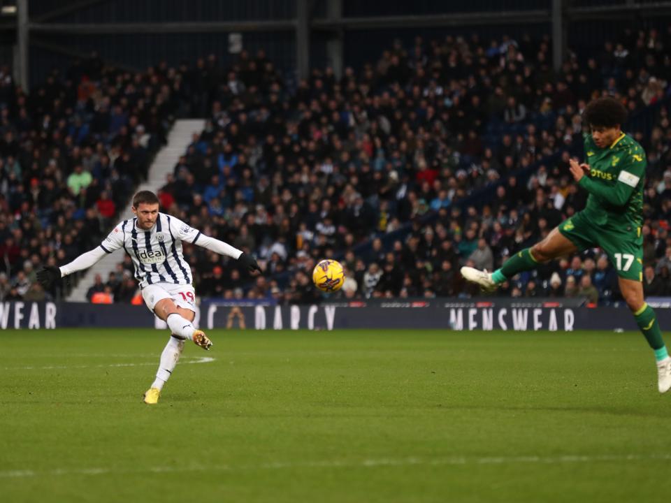 John Swift strikes at goal against Norwich 