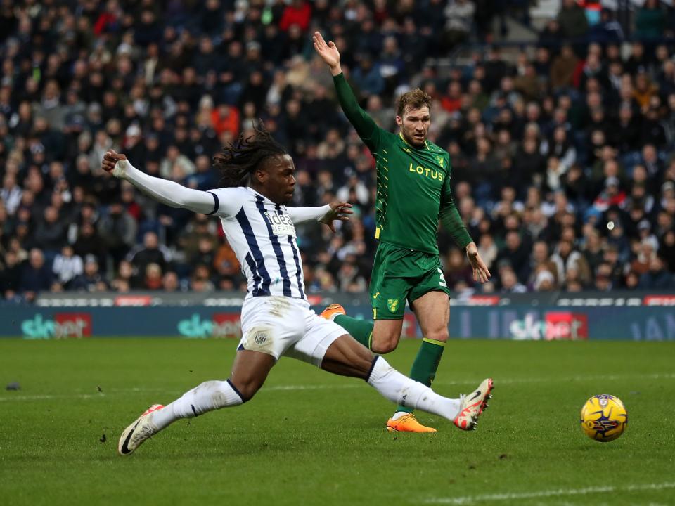 Brandon Thomas-Asante stretches for the ball against Norwich