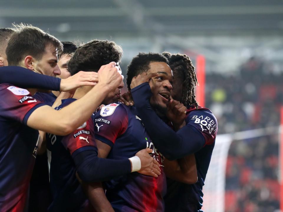 Grady Diangana celebrates scoring against Rotherham with his team-mates