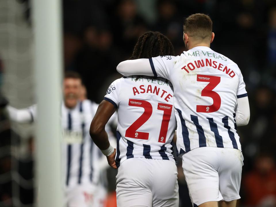 Brandon Thomas-Asante celebrates scoring against Norwich with Conor Townsend