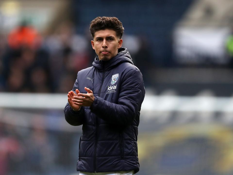 Jeremy Sarmiento applauds supporters after the Stoke game