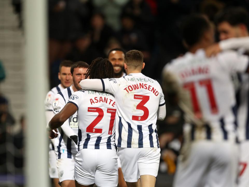 Brandon Thomas-Asante celebrates scoring against Norwich with Conor Townsend