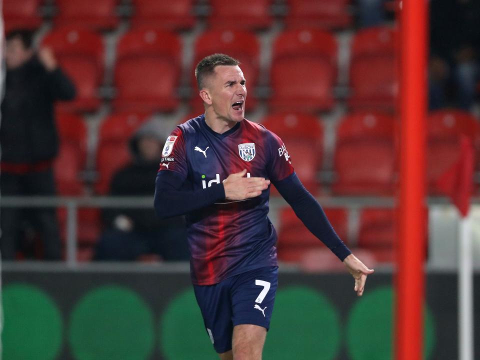 Jed Wallace celebrates scoring at Rotherham