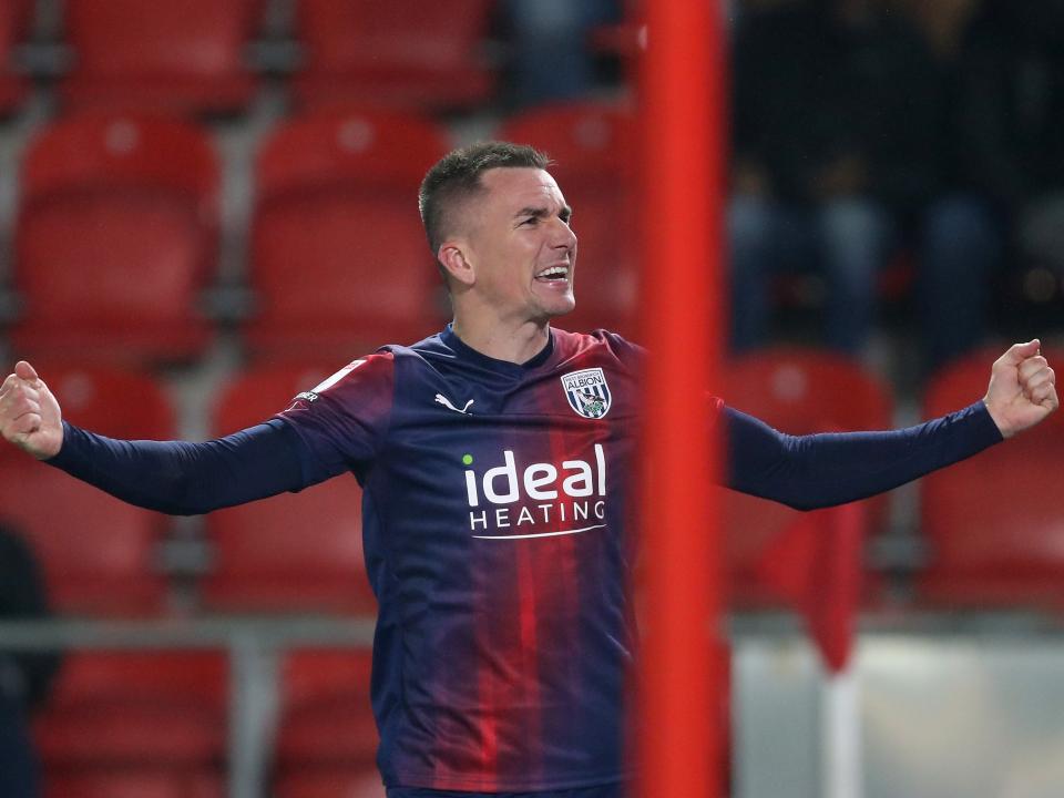Jed Wallace celebrates scoring at Rotherham