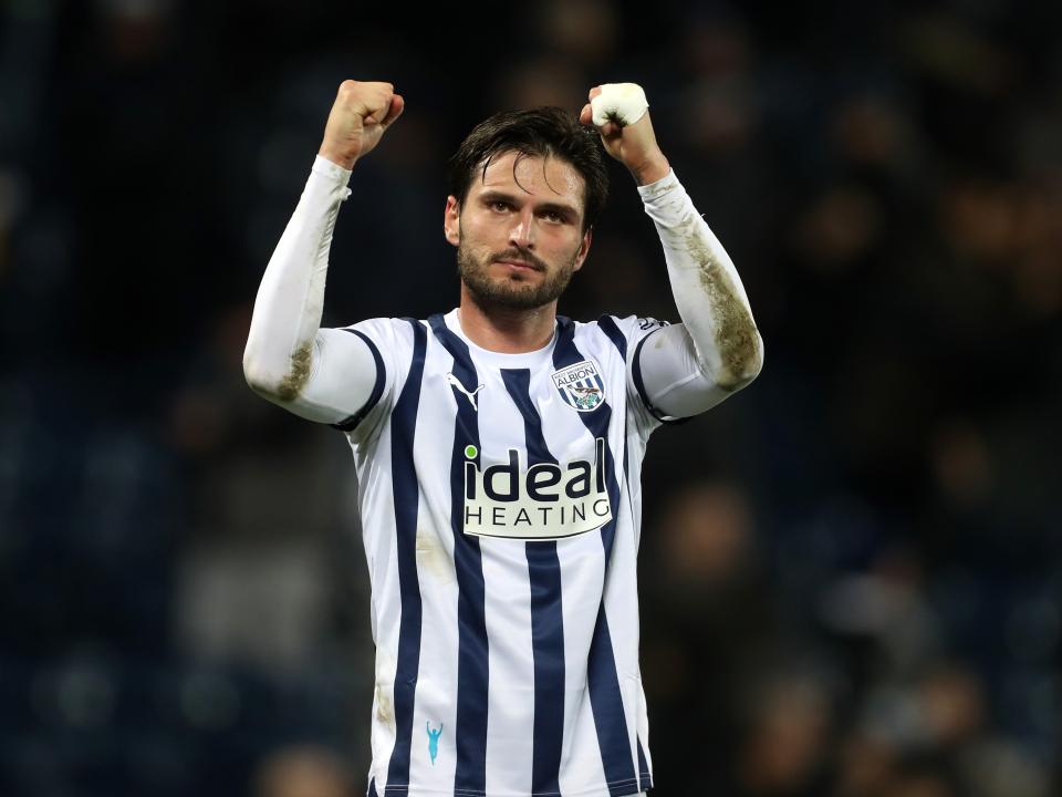 OKay Yokuslu applauds supporters after full-time against Leeds