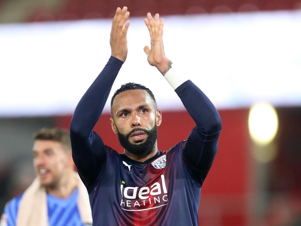 Kyle Bartley applauds Albion fans after the match