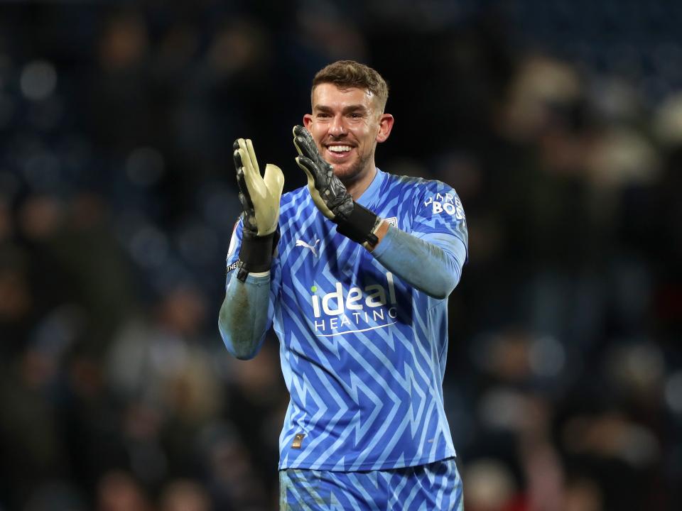 Alex Palmer celebrates the win against Leeds
