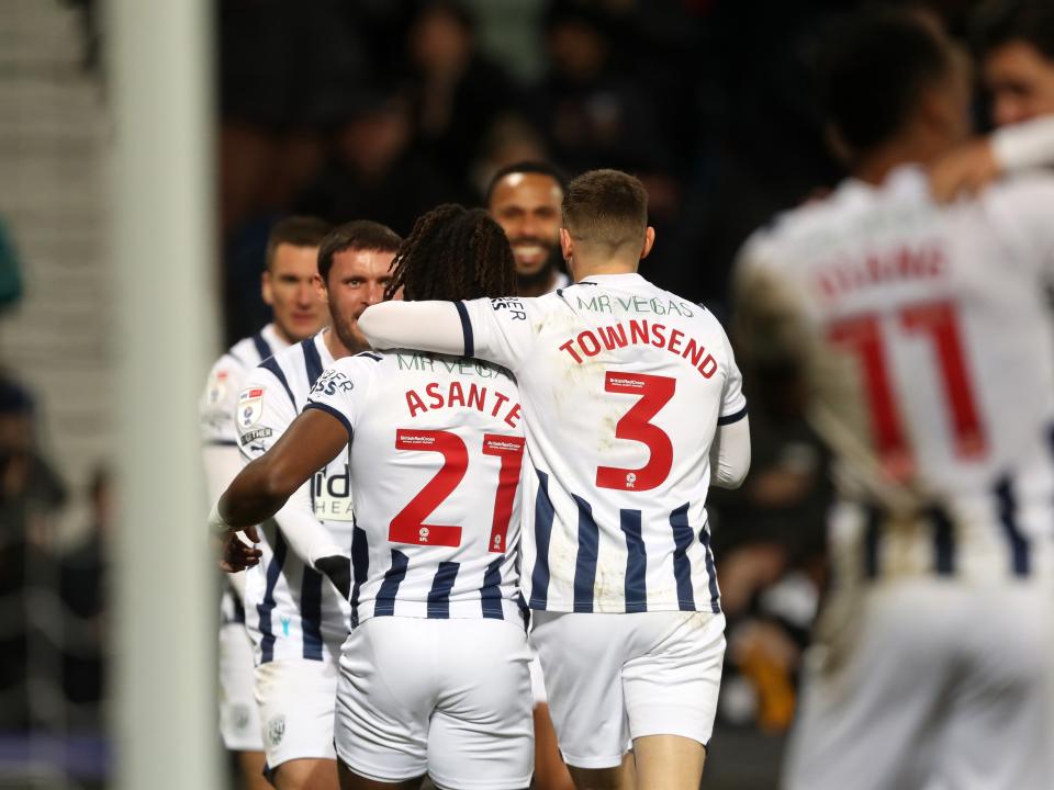 An image of Brandon Thomas-Asante celebrating with his teammates