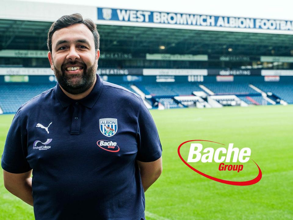 Shin Aquila standing pitchside