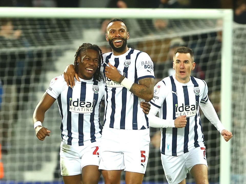 Brandon Thomas-Asante celebrates scoring against Norwich with Kyle Bartley