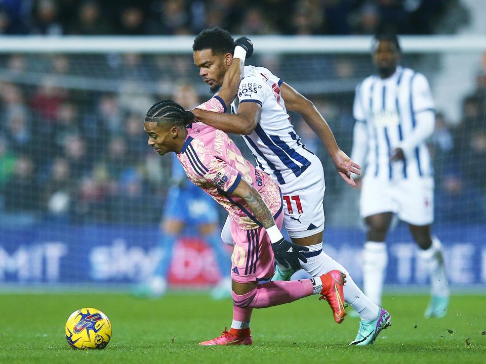 Grady Diangana fights for the ball against Leeds