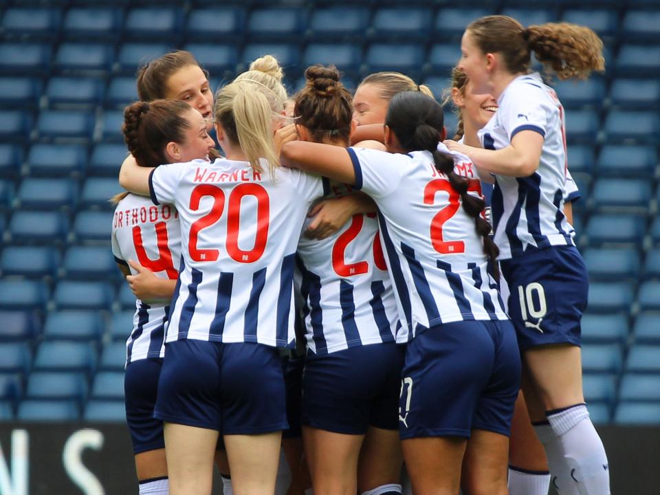 Albion Women celebrate, in home colours.