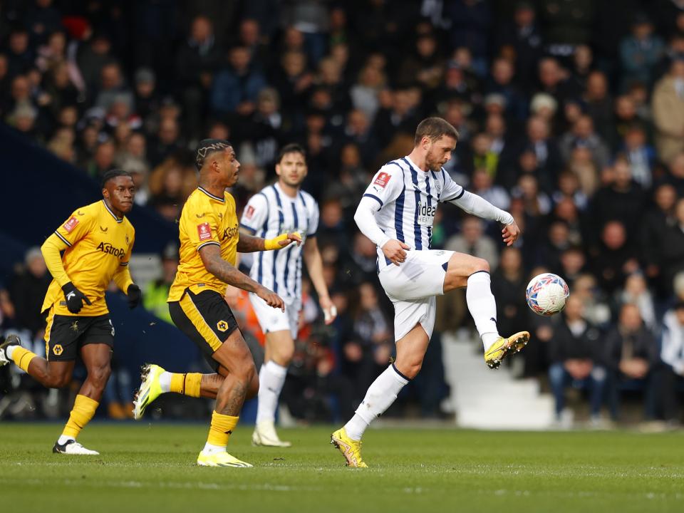 John Swift on the ball against Wolves