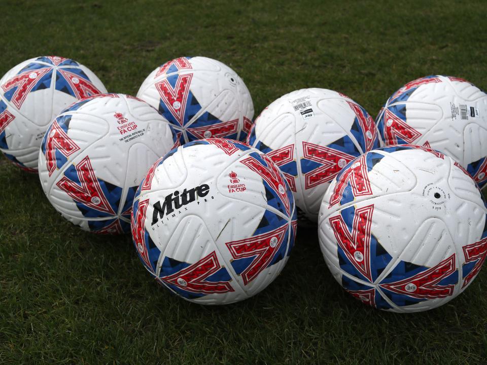 Mitre FA Cup footballs on the training pitch