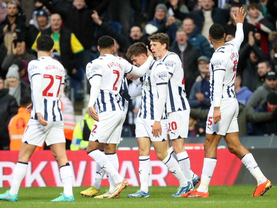 Albion players celebrate with Tom Fellows after his goal against Blackburn