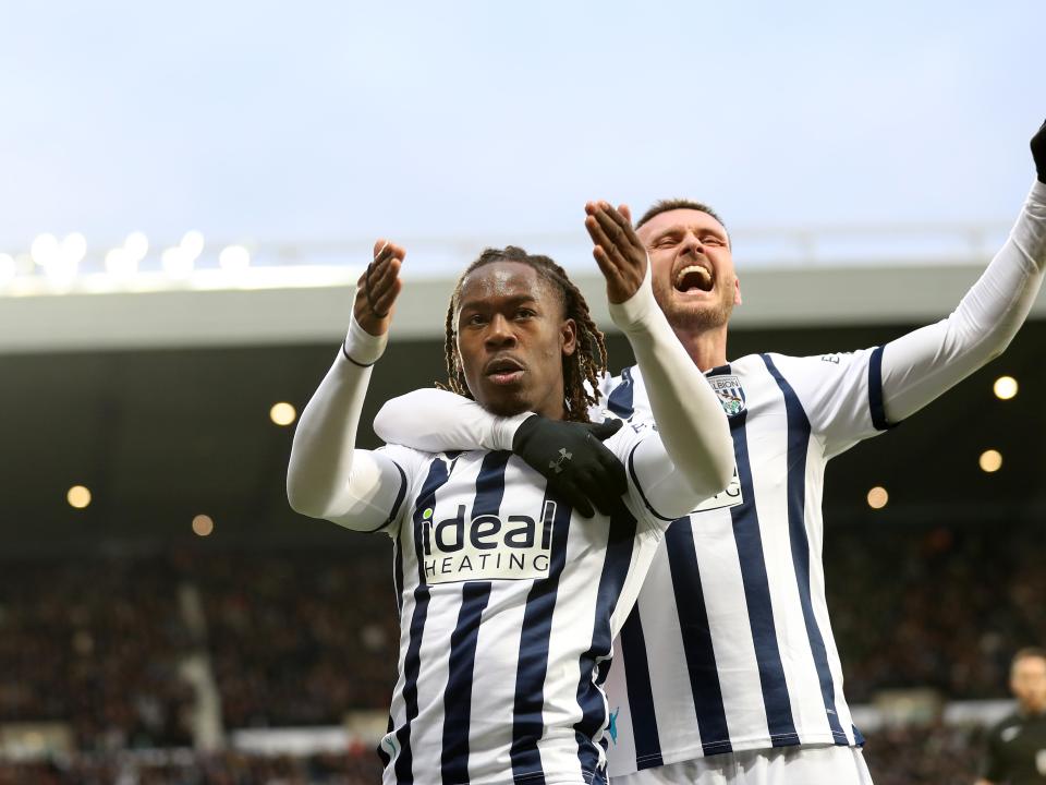Brandon Thomas-Asante celebrates scoring against Blackburn with John Swift