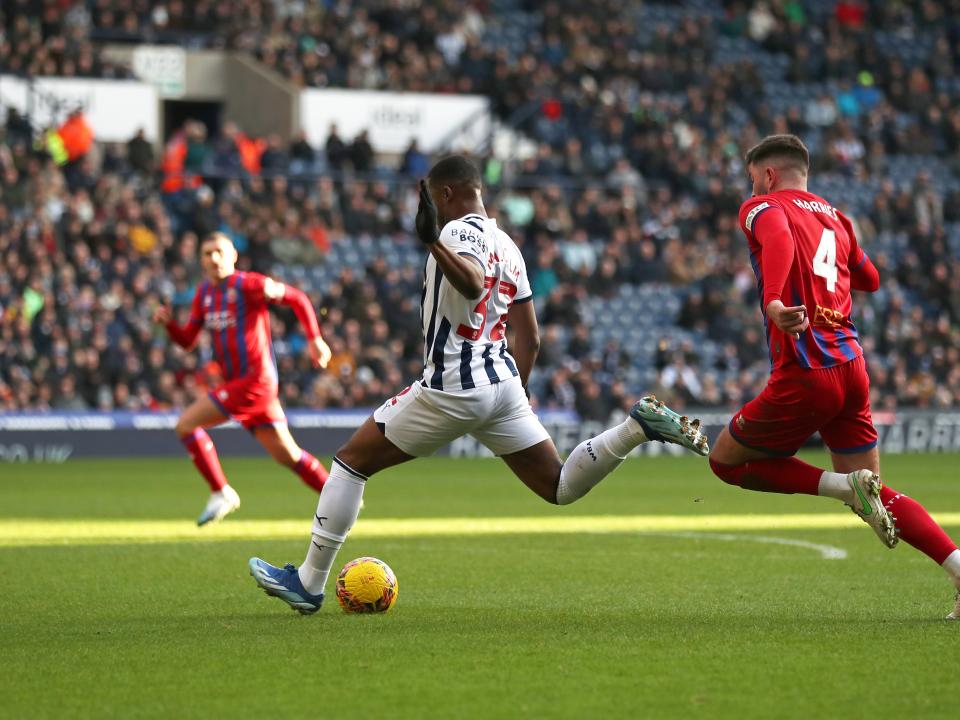 Jovan Malcolm shoots at goal against Aldershot and scores