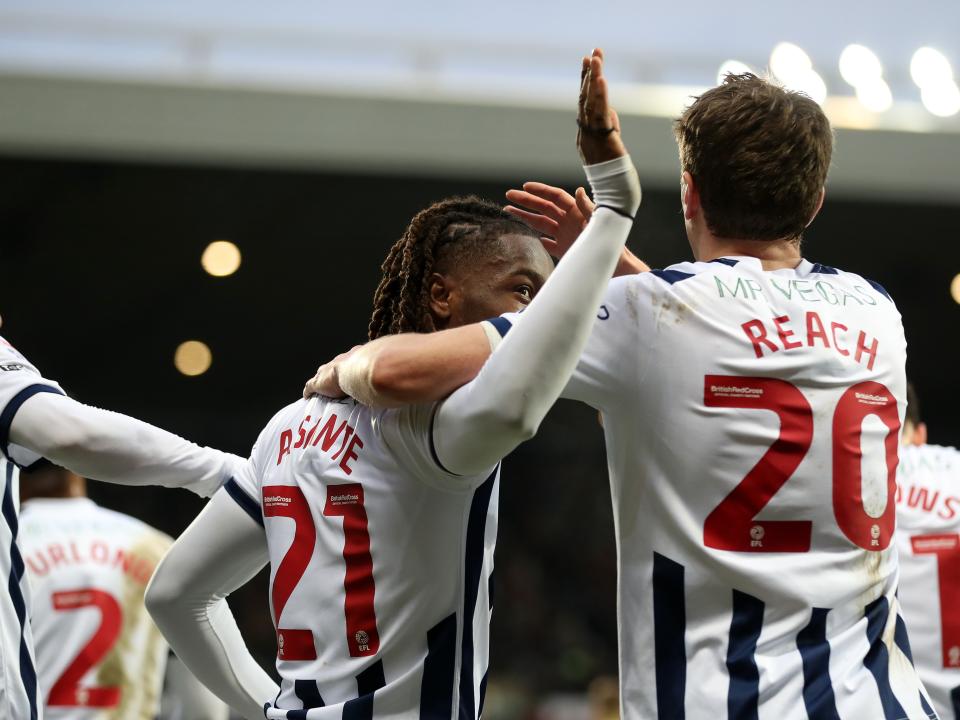 Brandon Thomas-Asante celebrates scoring against Blackburn with Adam Reach
