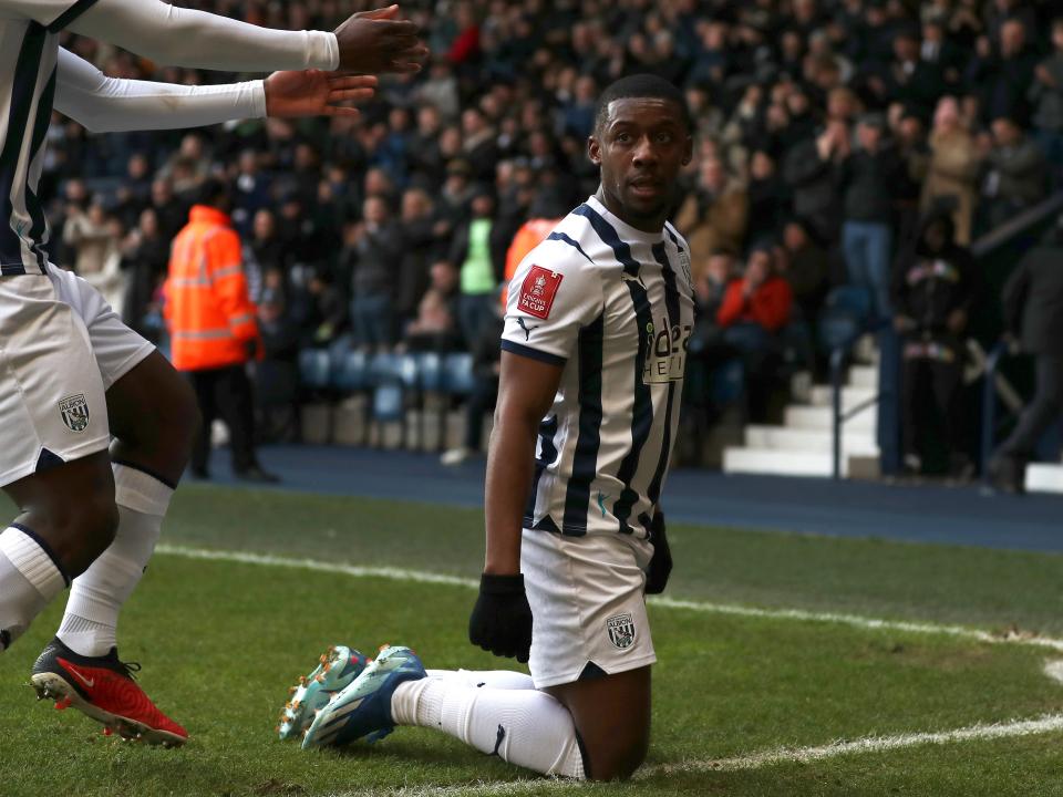 Jovan Malcolm celebrates scoring against Aldershot