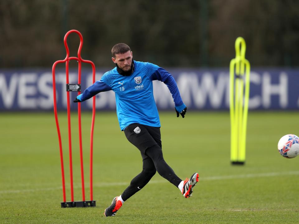 John Swift striking a ball in training