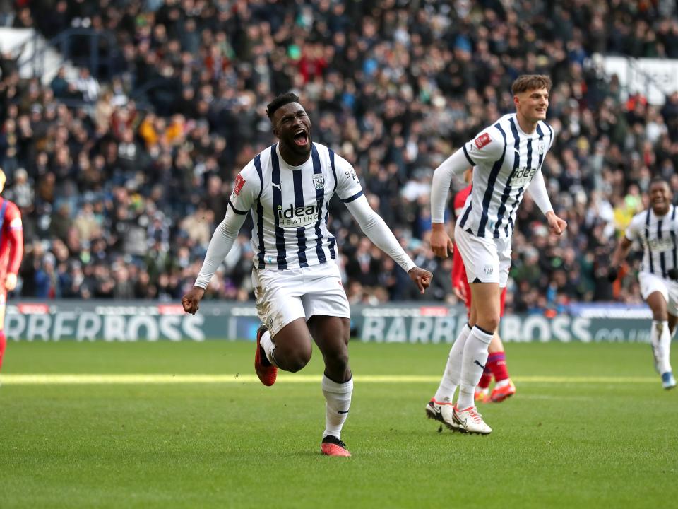 Daryl Dike celebrates scoring against Aldershot