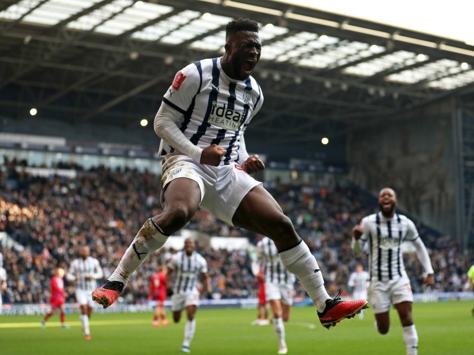 Daryl Dike celebrates scoring against Aldershot