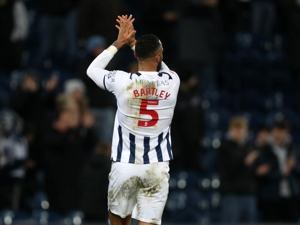 Kyle Bartley applauds supporters after full time against Blackburn
