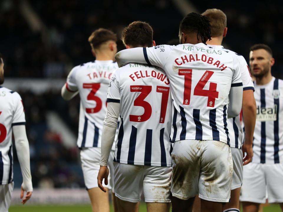 Tom Fellows celebrates scoring against Aldershot with team-mates