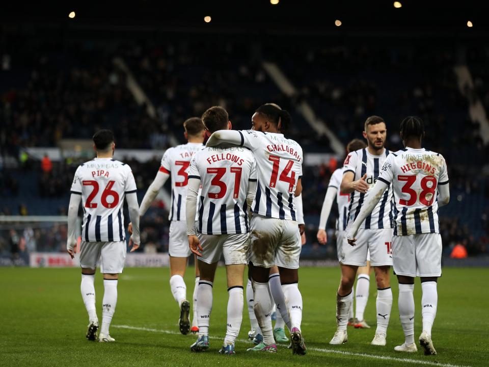 Tom Fellows celebrates scoring against Aldershot with team-mates