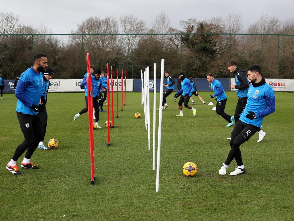 Albion players taking part in a passing drill 