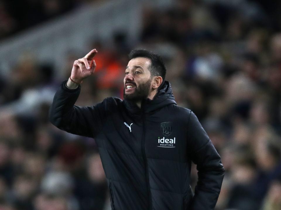 Carlos Corberan shouts instructions to his players from the side of the pitch