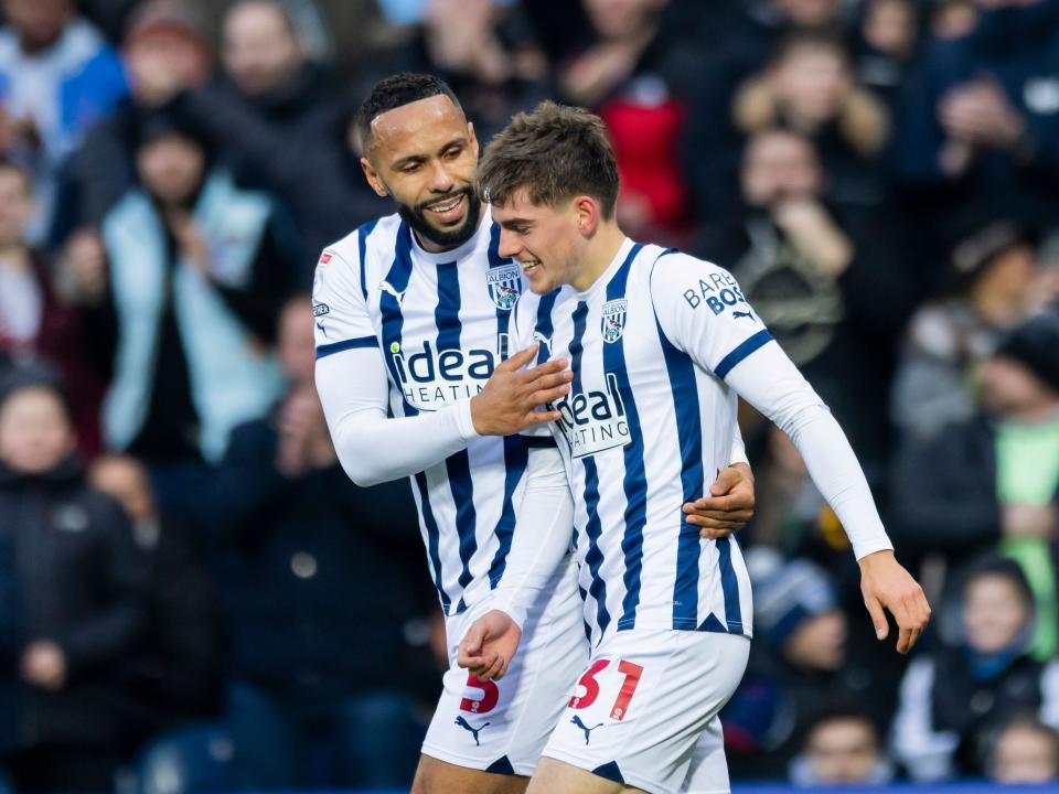 Kyle Bartley celebrates with Tom Fellows after his Blackburn goal