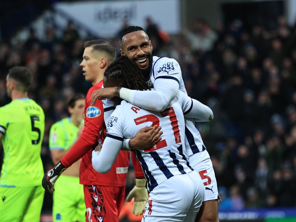 Brandon Thomas-Asante and Kyle Bartley celebrate Albion's third goal against Blackburn 