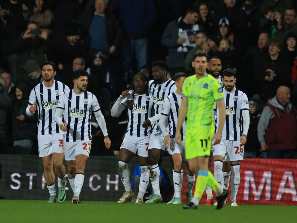 Brandon Thomas-Asante celebrates scoring his second against Blackburn with team-mates