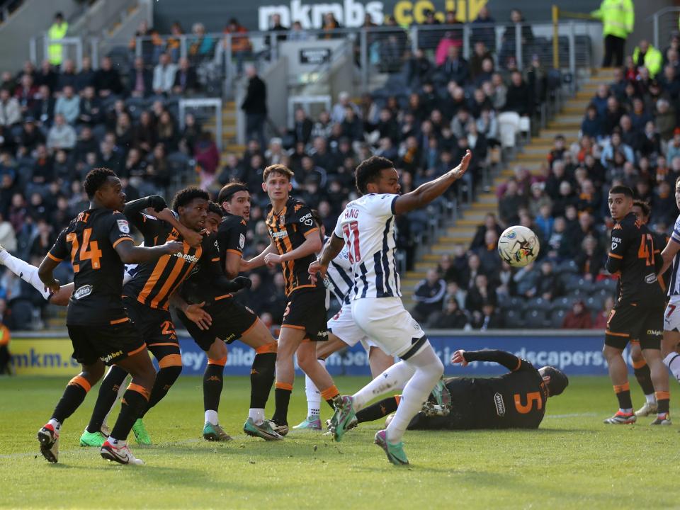 Grady Diangana attempts to make contact with the ball in the Hull penalty area